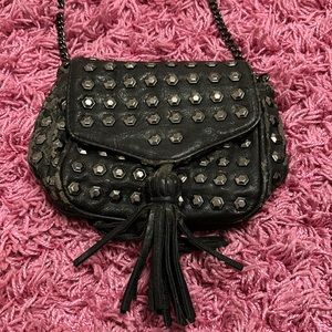 Women’s small black pocketbook